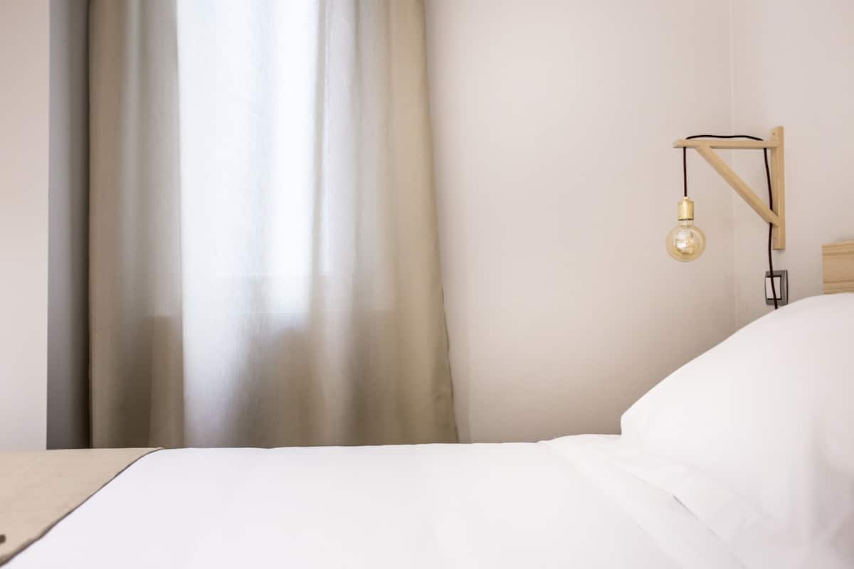 Desk, blackout curtains, free WiFi, bed sheets