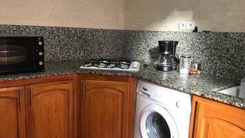 Fridge, oven, stovetop, espresso maker