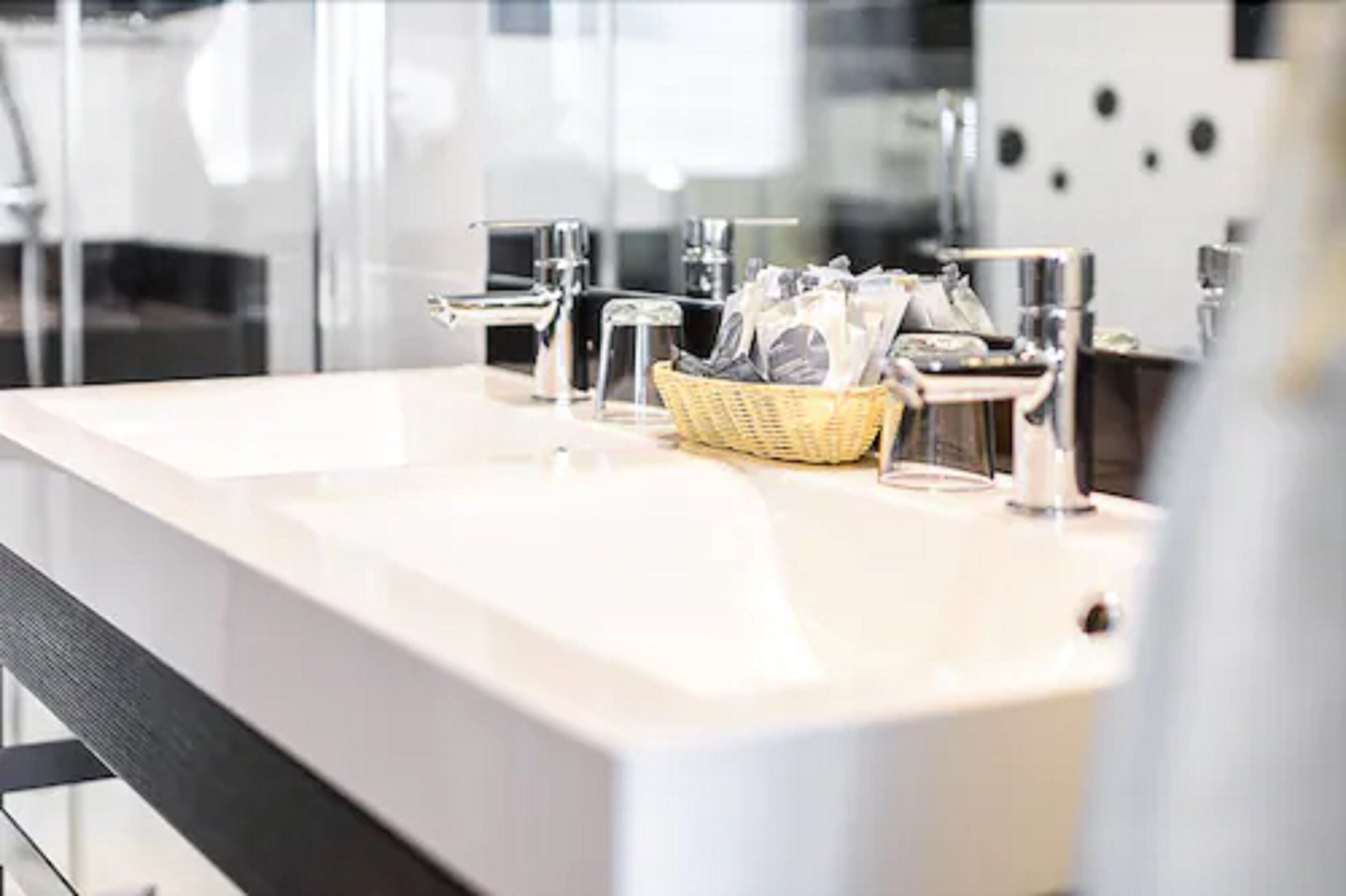 luxury apartment | bathroom | hair dryer, towels, soap, shampoo