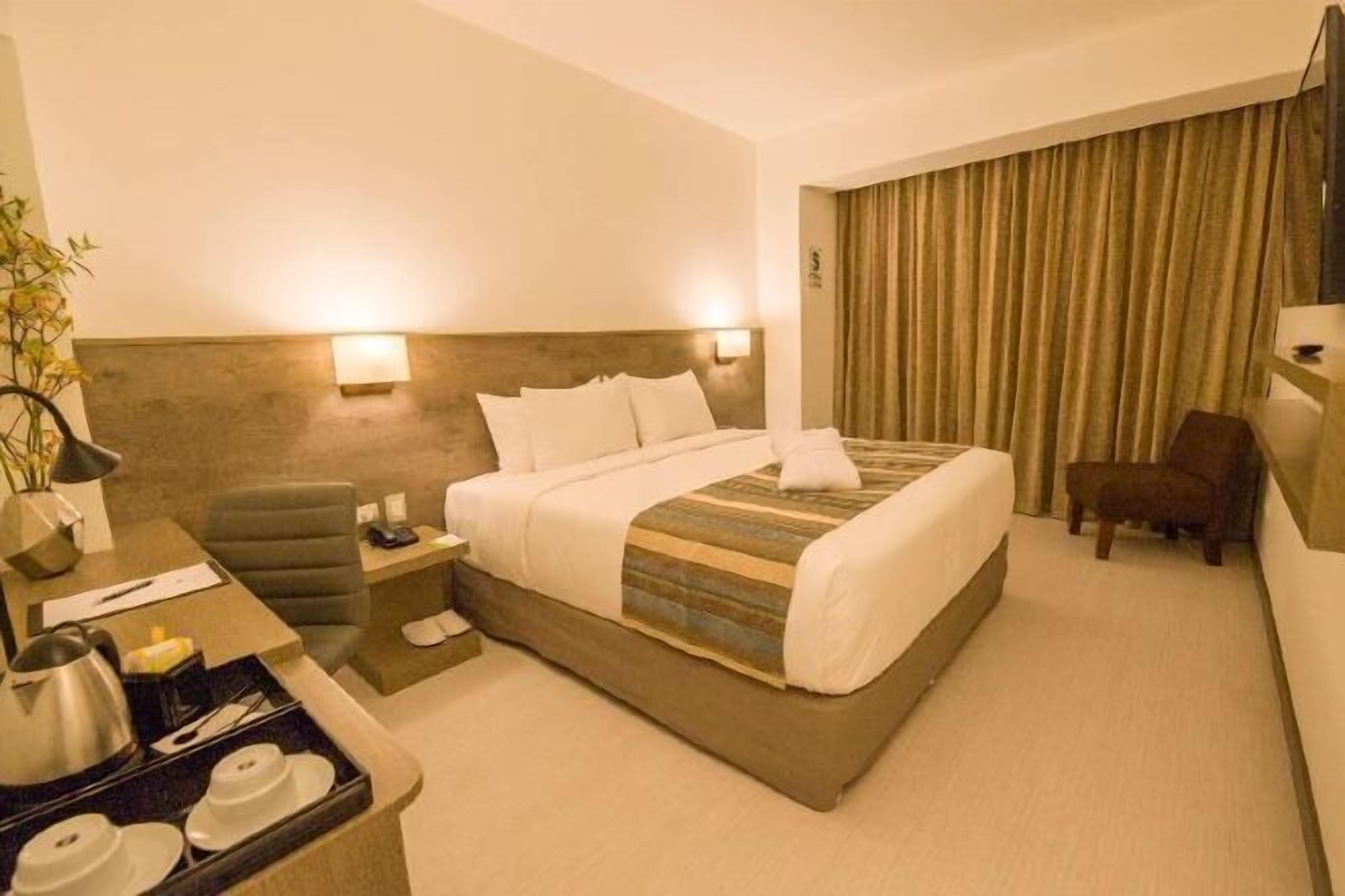 1 dormitorio, edredones de plumas, minibar y caja fuerte