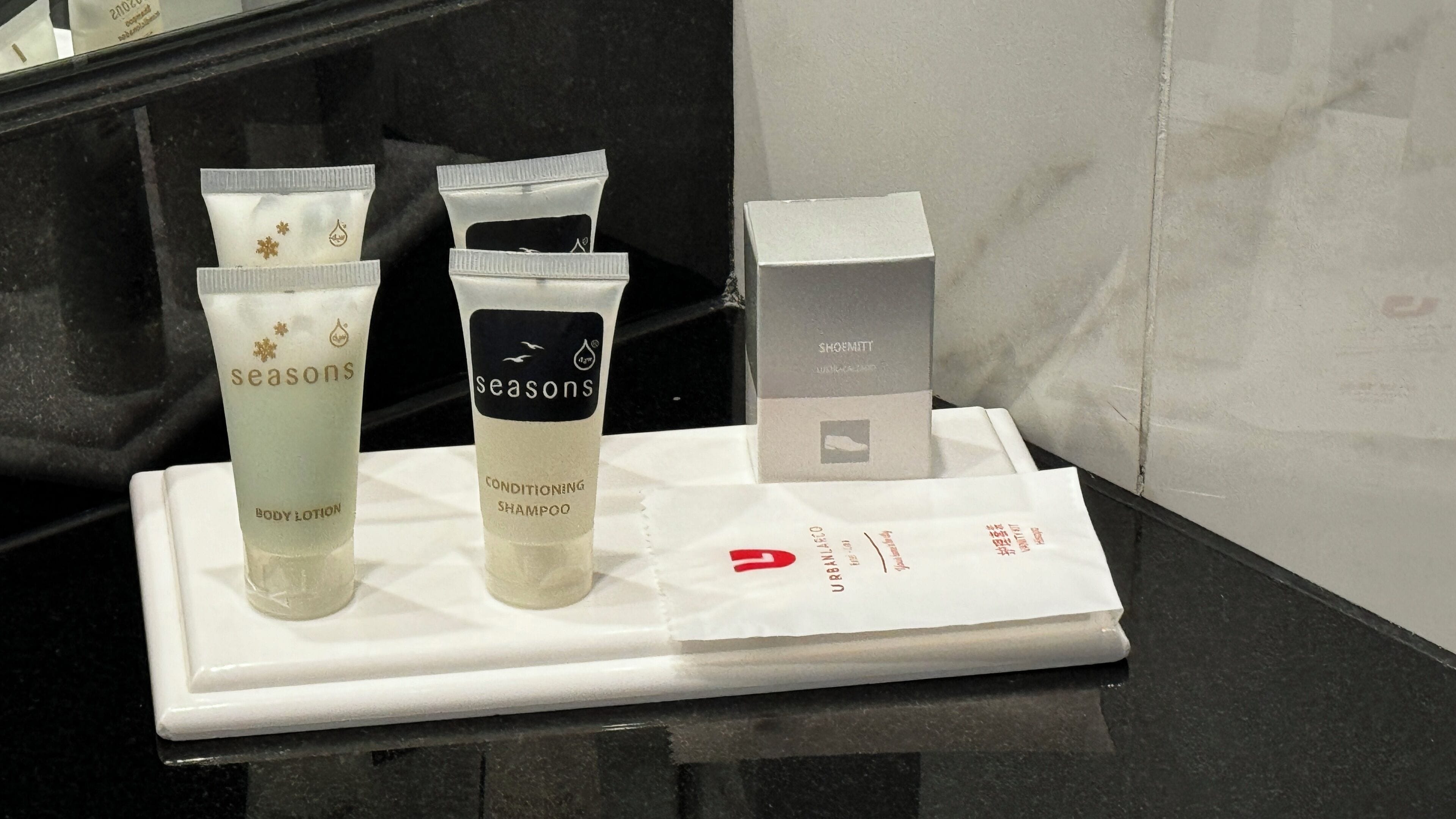 shower, rainfall showerhead, hair dryer, towels