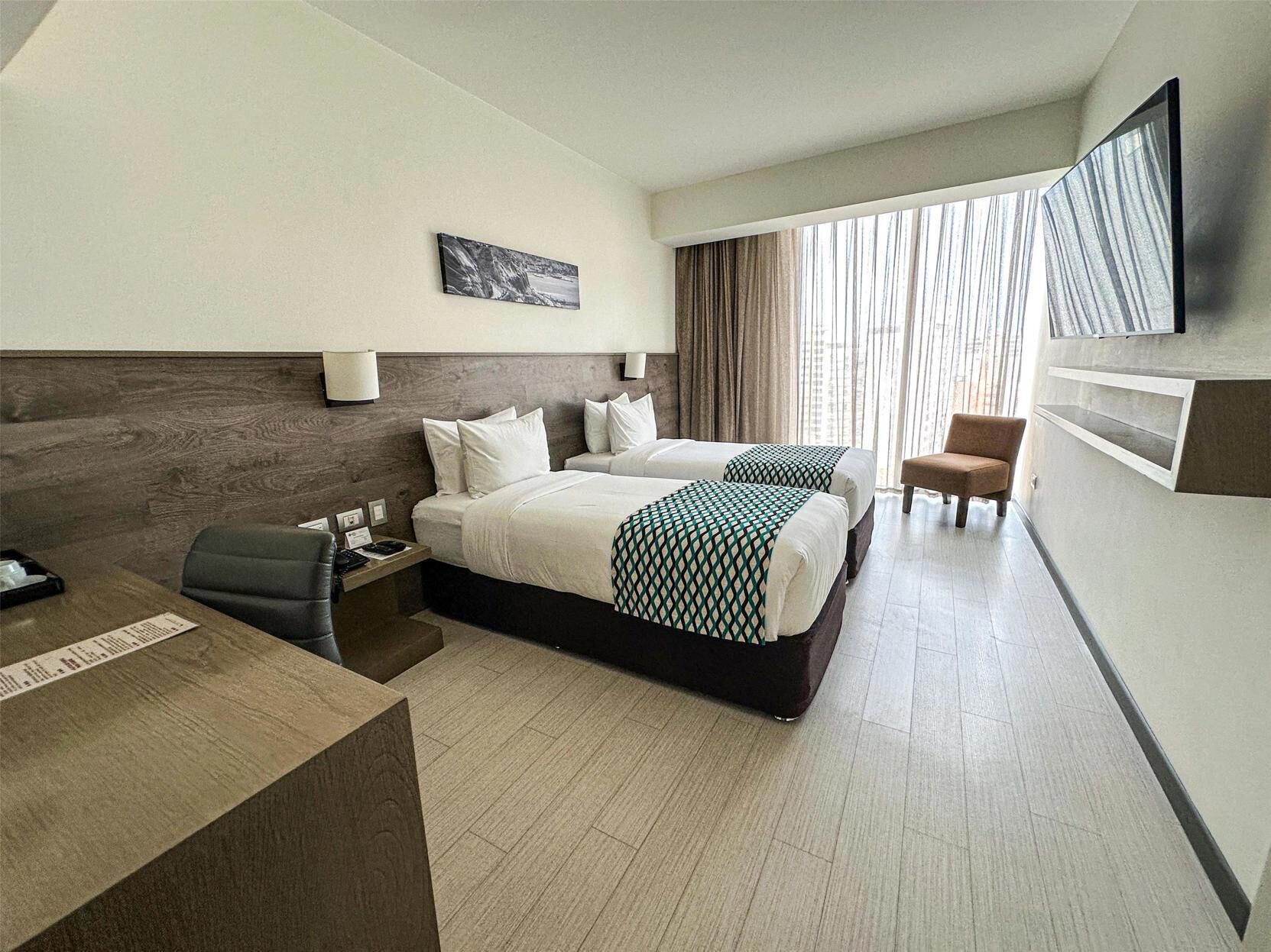 1 slaapkamer, donzen dekbedden, een minibar, een kluis op de kamer