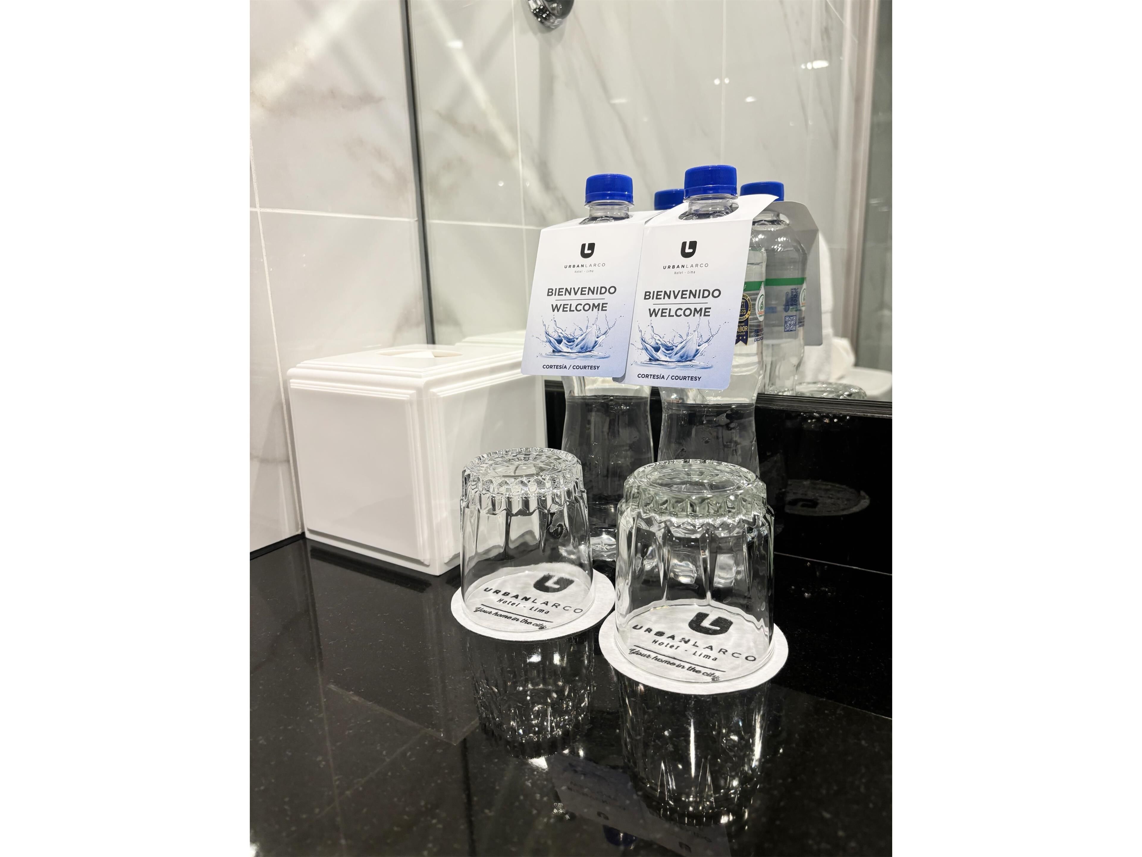 shower, rainfall showerhead, hair dryer, towels