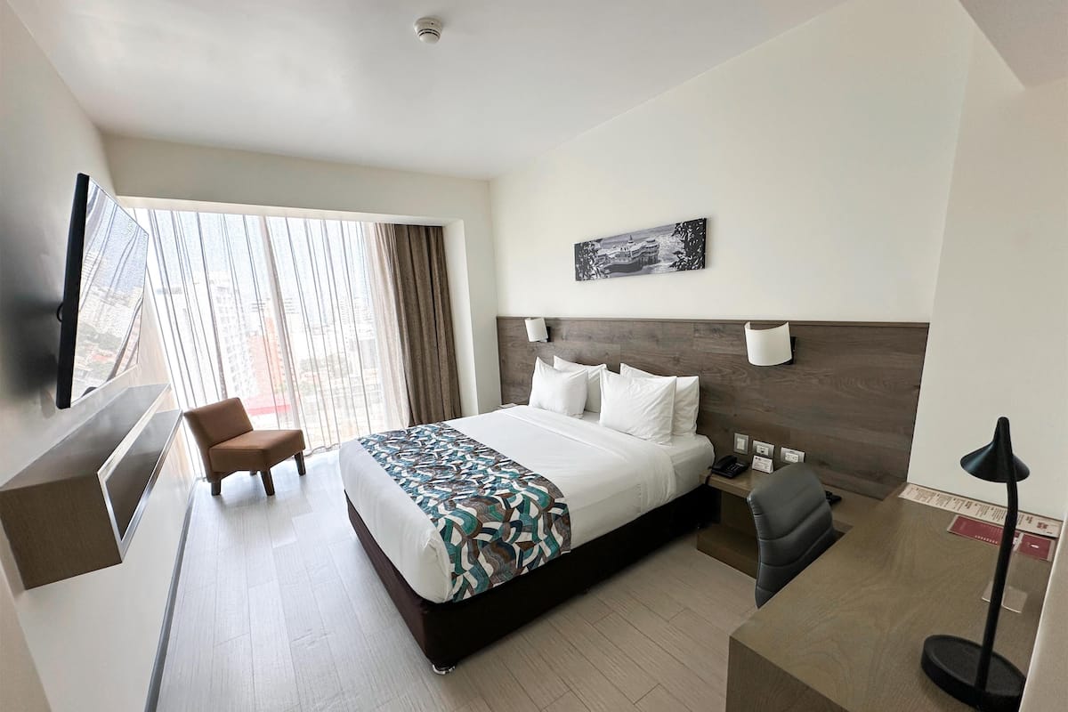 1 quarto, edredons de pluma, frigobar, cofres nos quartos