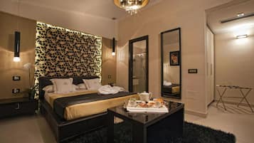 Habitación superior | Ropa de cama de alta calidad y minibar