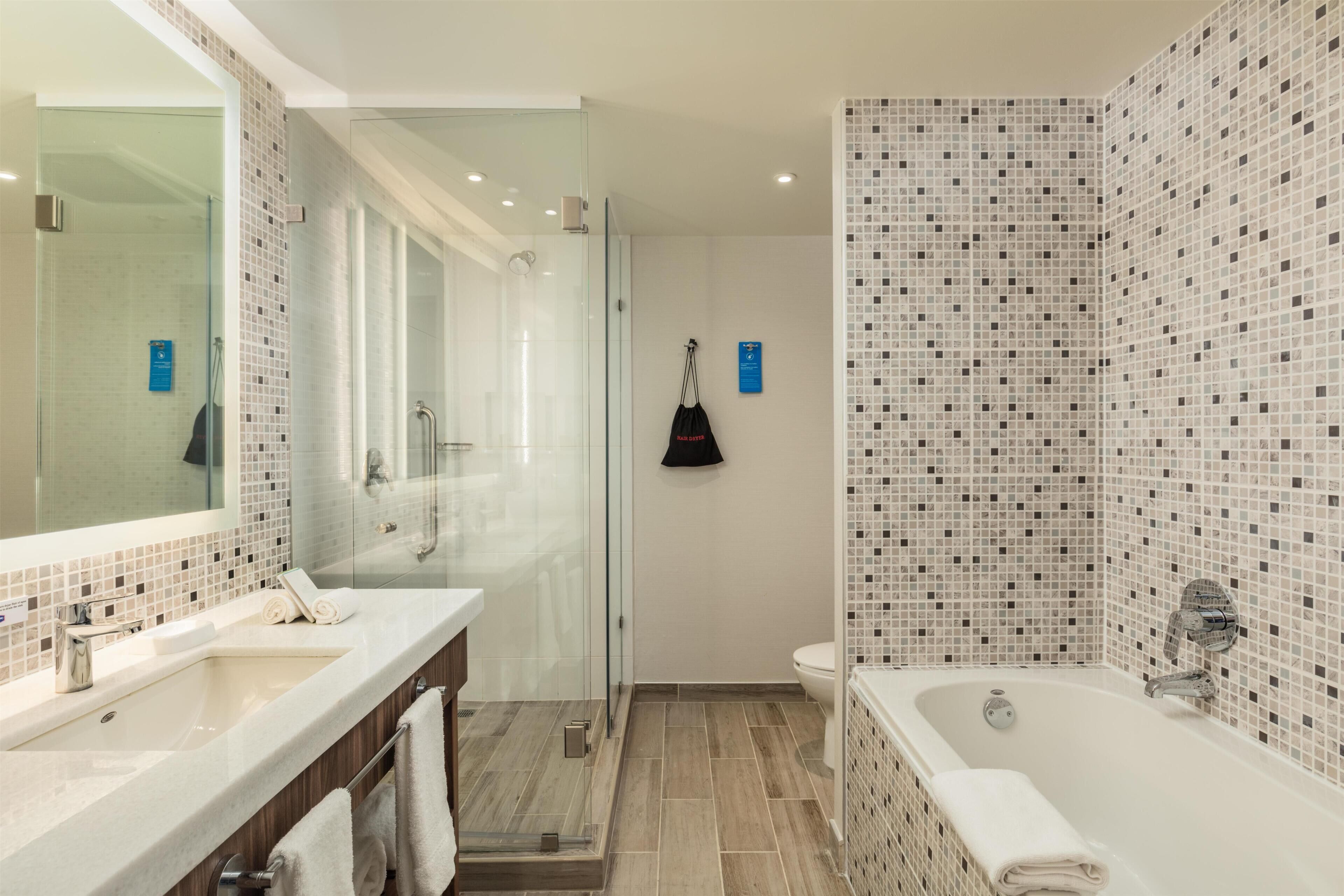 Premium King Room with Sofa Bed and Bath | Bathroom | Shower, free toiletries, hair dryer, towels