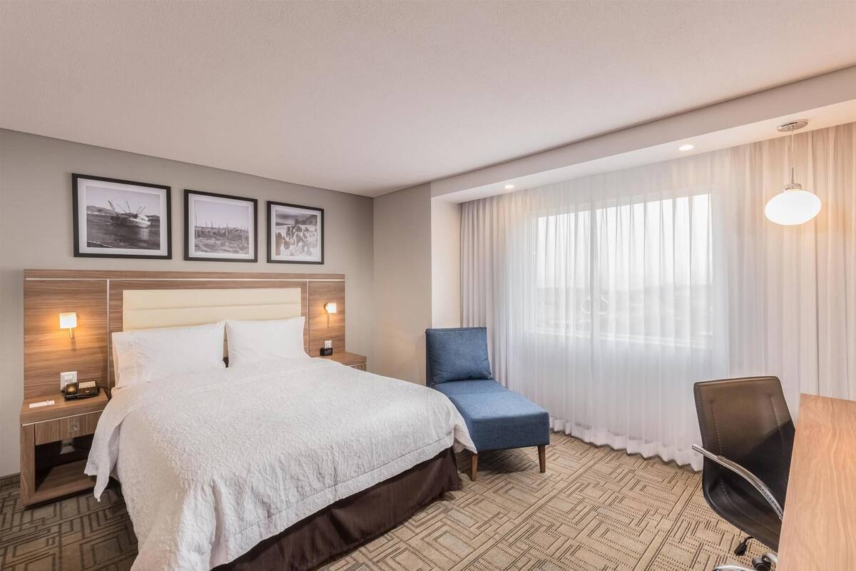 Premium bedding, down comforters, pillowtop beds, in-room safe