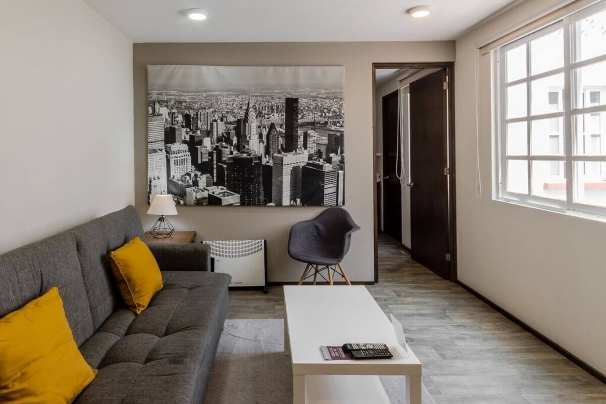 Standard Apartment | Living area | 32-inch Smart TV with cable channels, TV