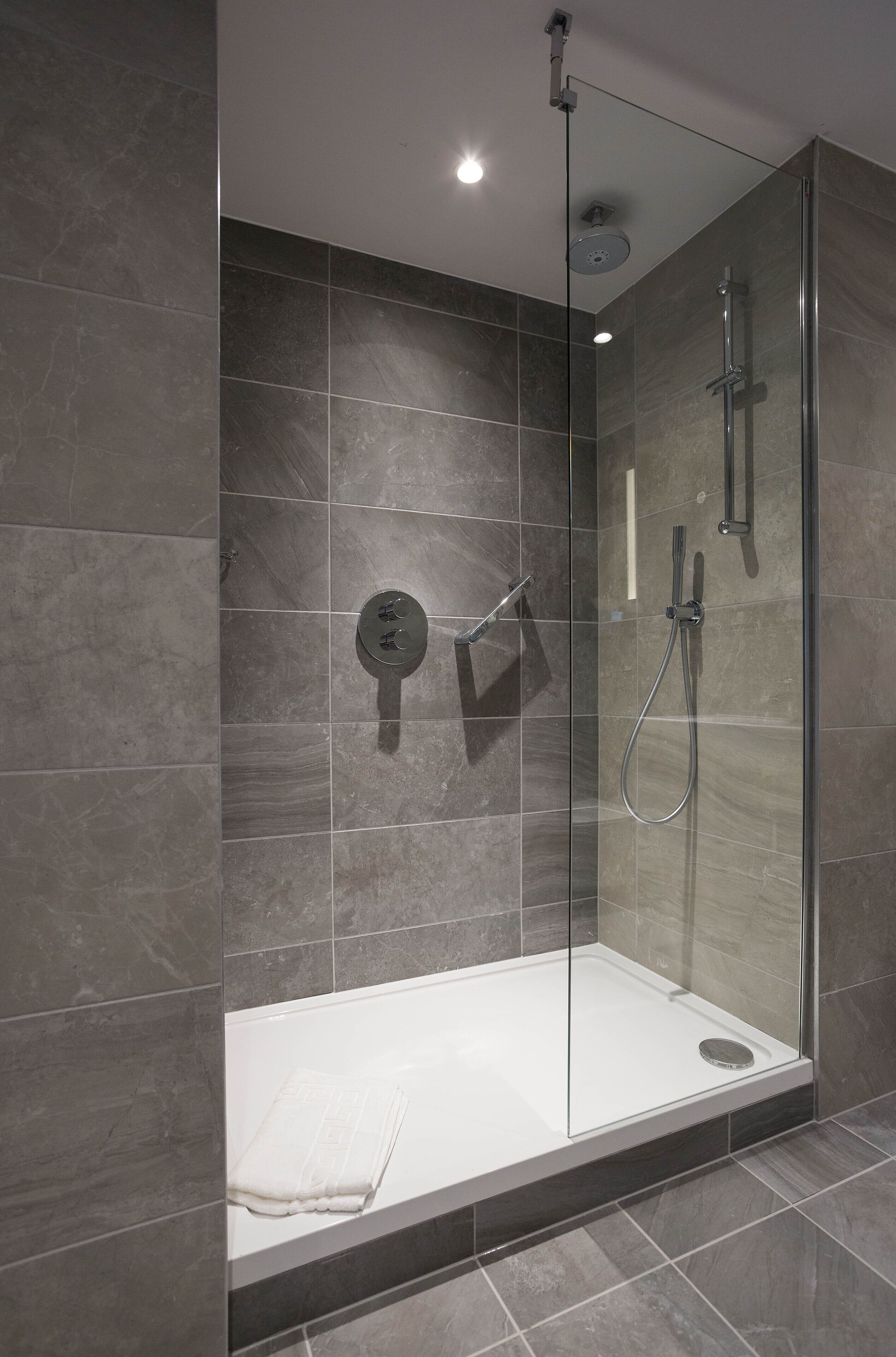 shower, eco-friendly toiletries, hair dryer, towels