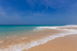 On the beach, beach towels