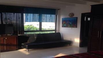 Family Apartment, 1 Bedroom | Living area | Flat-screen TV
