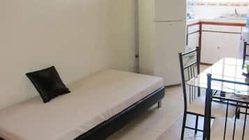 Departamento Confort, 1 habitación | Área de sala de estar | Televisión
