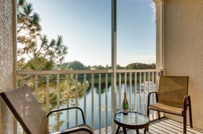 Enjoy a Glass of Wine on Your Private, Screened Balcony.