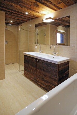 Bathtub, hair dryer, towels