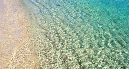 Maison de vacances avec lit Ă eau, pas de tourisme de masse, vue sur Tavolara