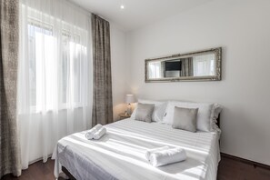 2 habitaciones, tabla de planchar con plancha, internet y ropa de cama 