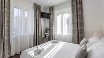 2 habitaciones, tabla de planchar con plancha y acceso a internet