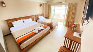 A hotel room with two beds, a small table, a TV, and a balcony with curtains. - Maihom Resort Dechatiwong Bridge (Nakhon Sawan)