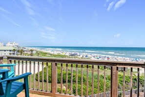 Living Area Deck has 2 Pub Height Chairs, 3 Pub Height Stools and Table