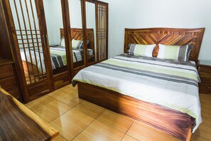 Deluxe Room | 1 bedroom, blackout curtains, free WiFi