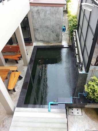 Outdoor pool. The Room Apartment