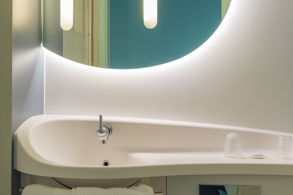 room, multiple beds | bathroom | shower, eco-friendly toiletries, hair dryer, towels