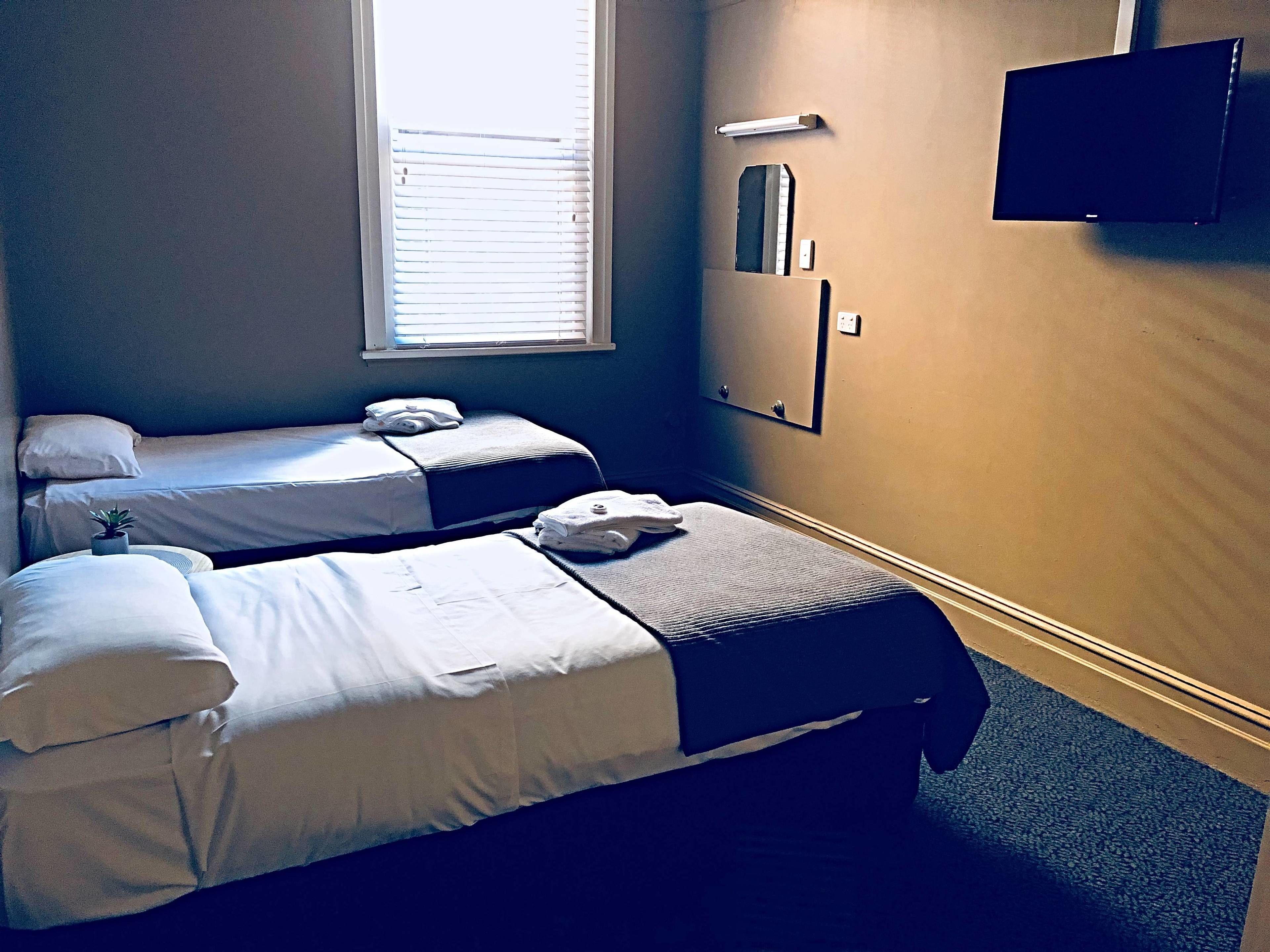 Standard Room, 2 Single Beds | WiFi (free), bed sheets