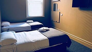 Standard Room, 2 Single Beds | WiFi (free), bed sheets