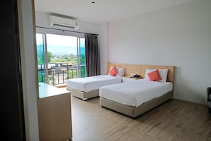 Minibar, desk, blackout curtains, rollaway beds