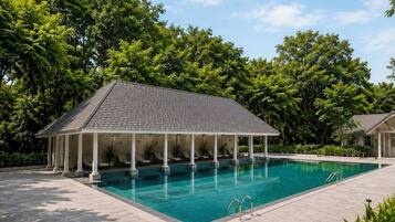 Outdoor pool, pool umbrellas, pool loungers