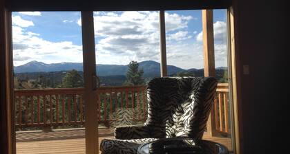 Spectacular panoramic mtn views from this majestic 3 acre luxury chalet retreat