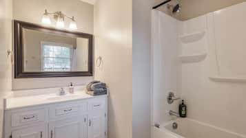 Combined shower/bathtub, hair dryer, towels, soap