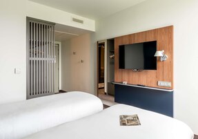 Quarto standard, 2 camas de solteiro | Quartos à prova de som, berços grátis, Wi-Fi de cortesia, roupa de cama