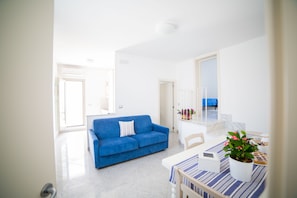Appartement, 1 chambre (4 PAX) | Salle de séjour | Télévision à écran plat