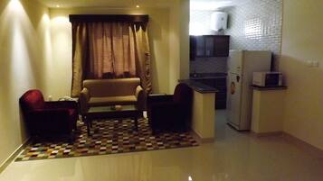 Apartment, 1 Bedroom, Kitchen | Living area | LCD TV