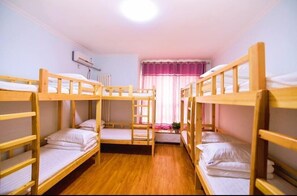 One Bed in Eight Beds Male Dorm