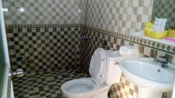 Shower, free toiletries, hair dryer, slippers