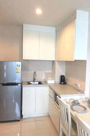 1-Bedroom Condo | Private kitchenette | Full-sized fridge, microwave, electric kettle - The Energy Huahin Rachapruek (Cha-am)