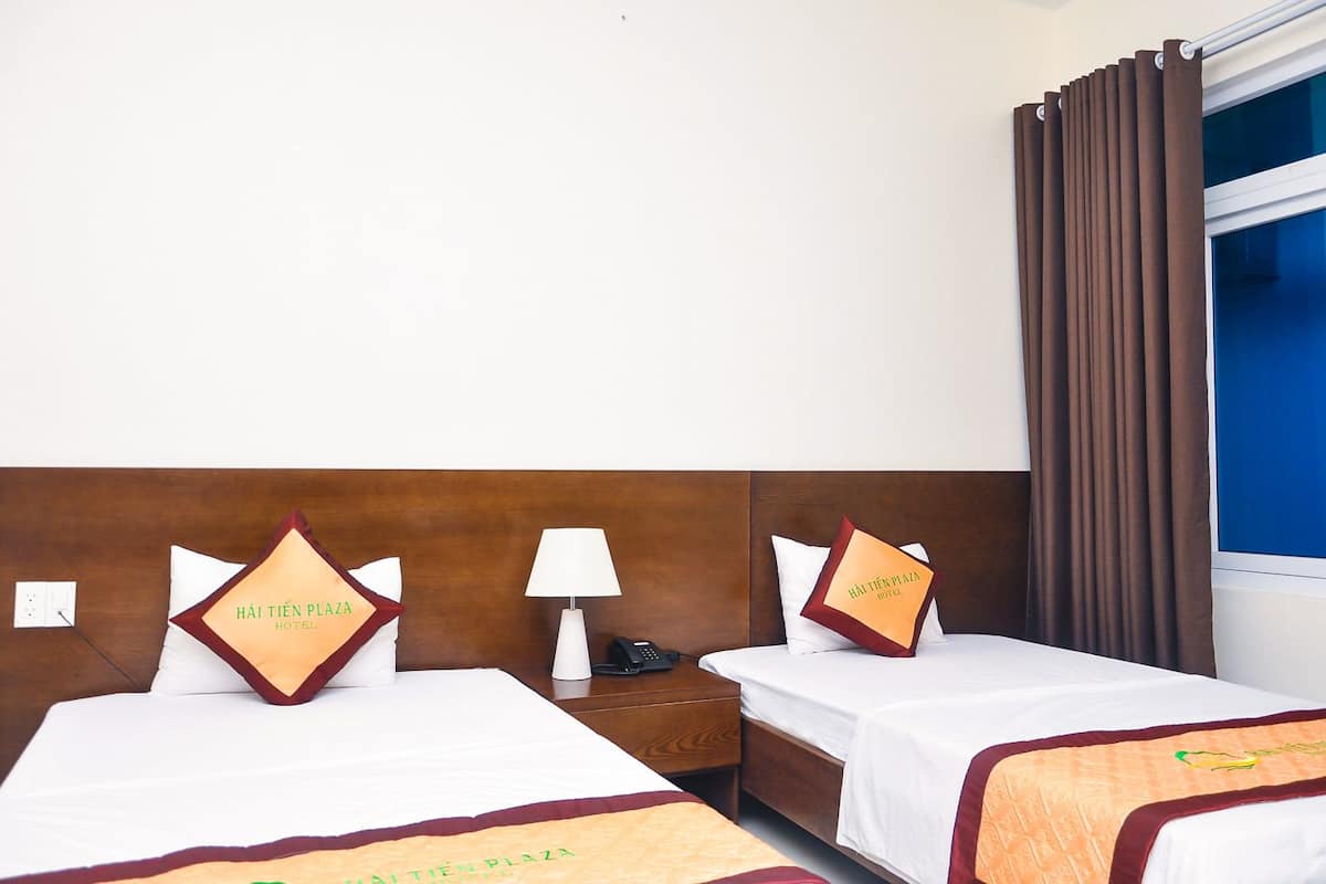 Twin Room | Minibar, in-room safe, desk, soundproofing