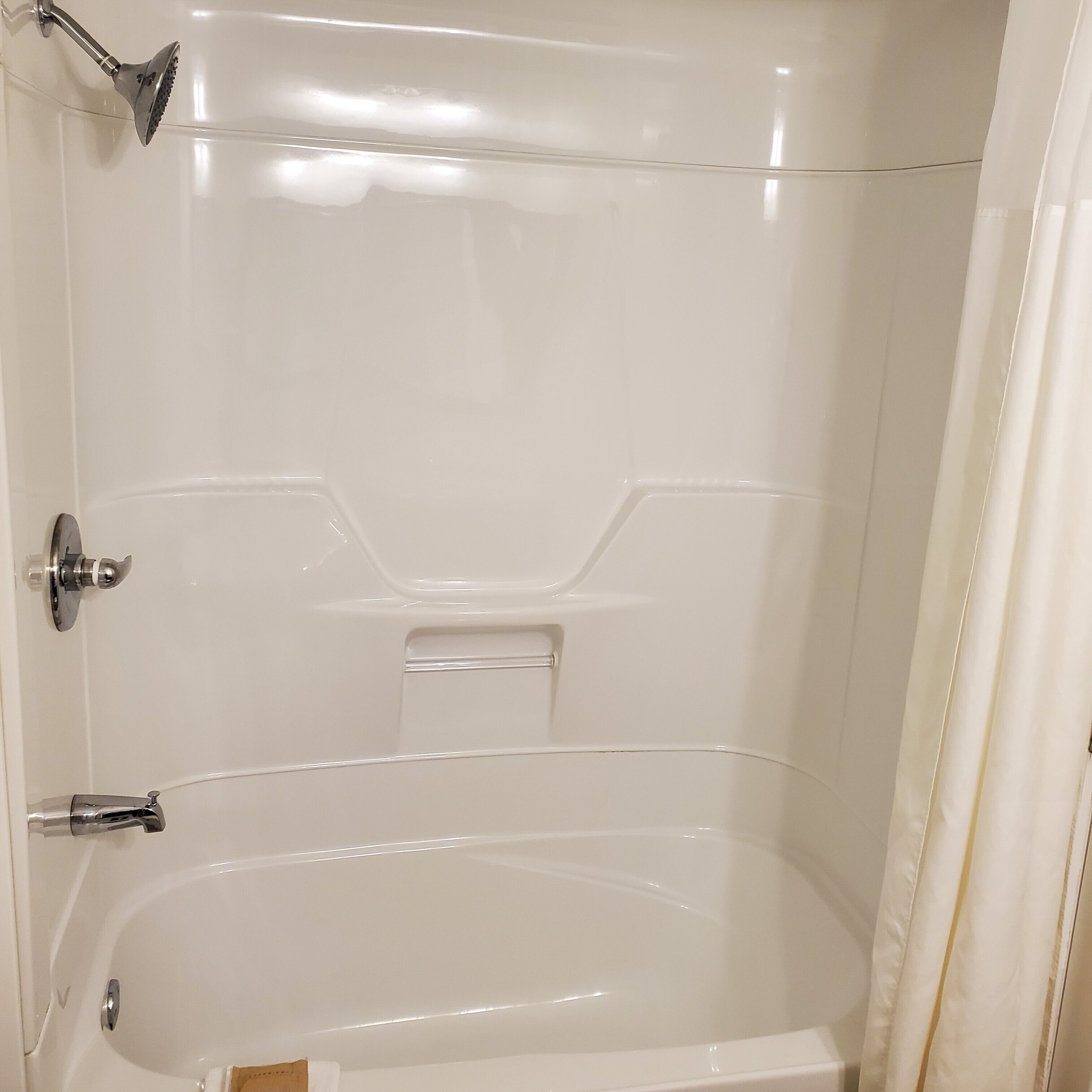 room, 1 queen bed | bathroom | combined shower/bathtub, deep-soaking bathtub, hair dryer, towels