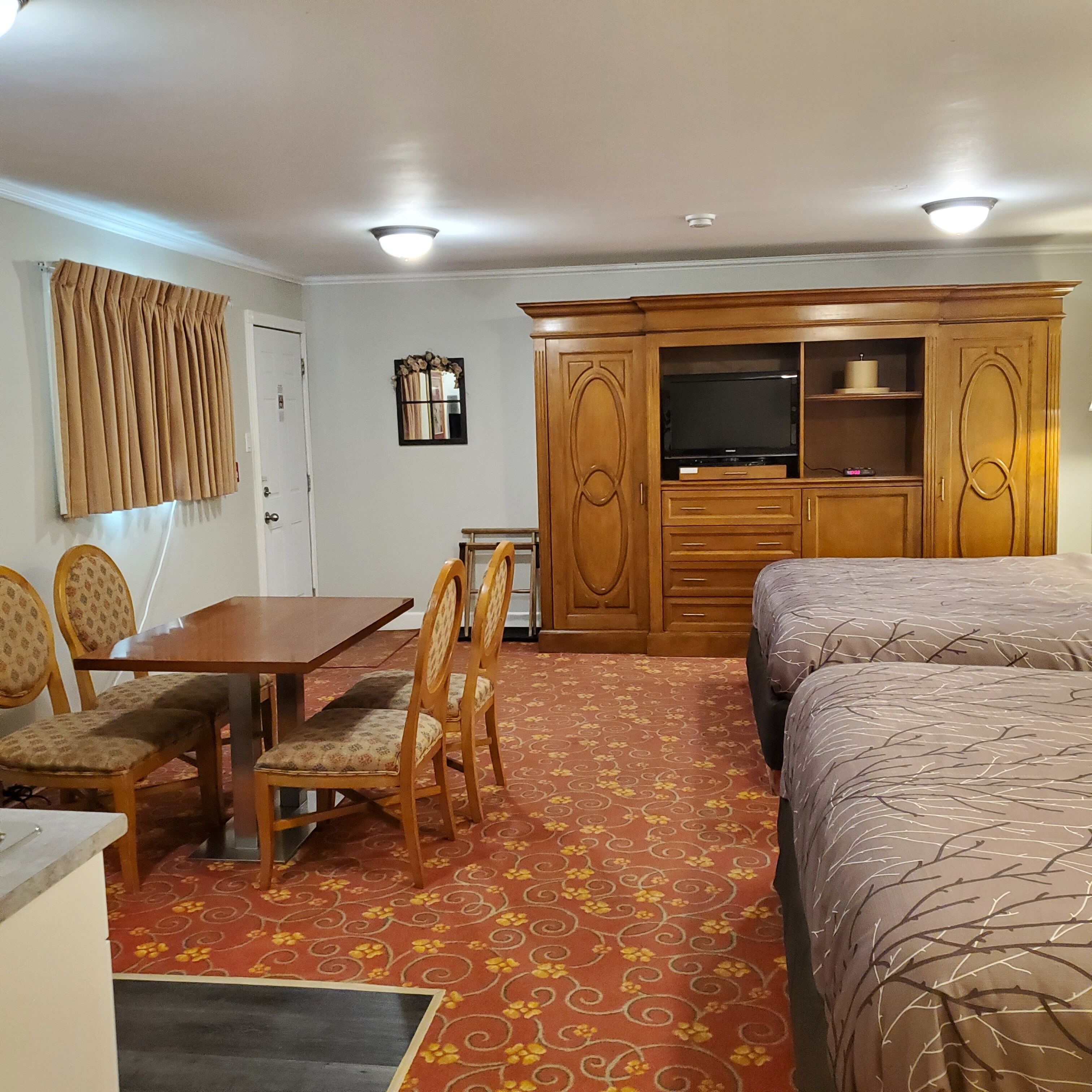 room, kitchenette | 1 bedroom, blackout curtains, iron/ironing board, free wifi