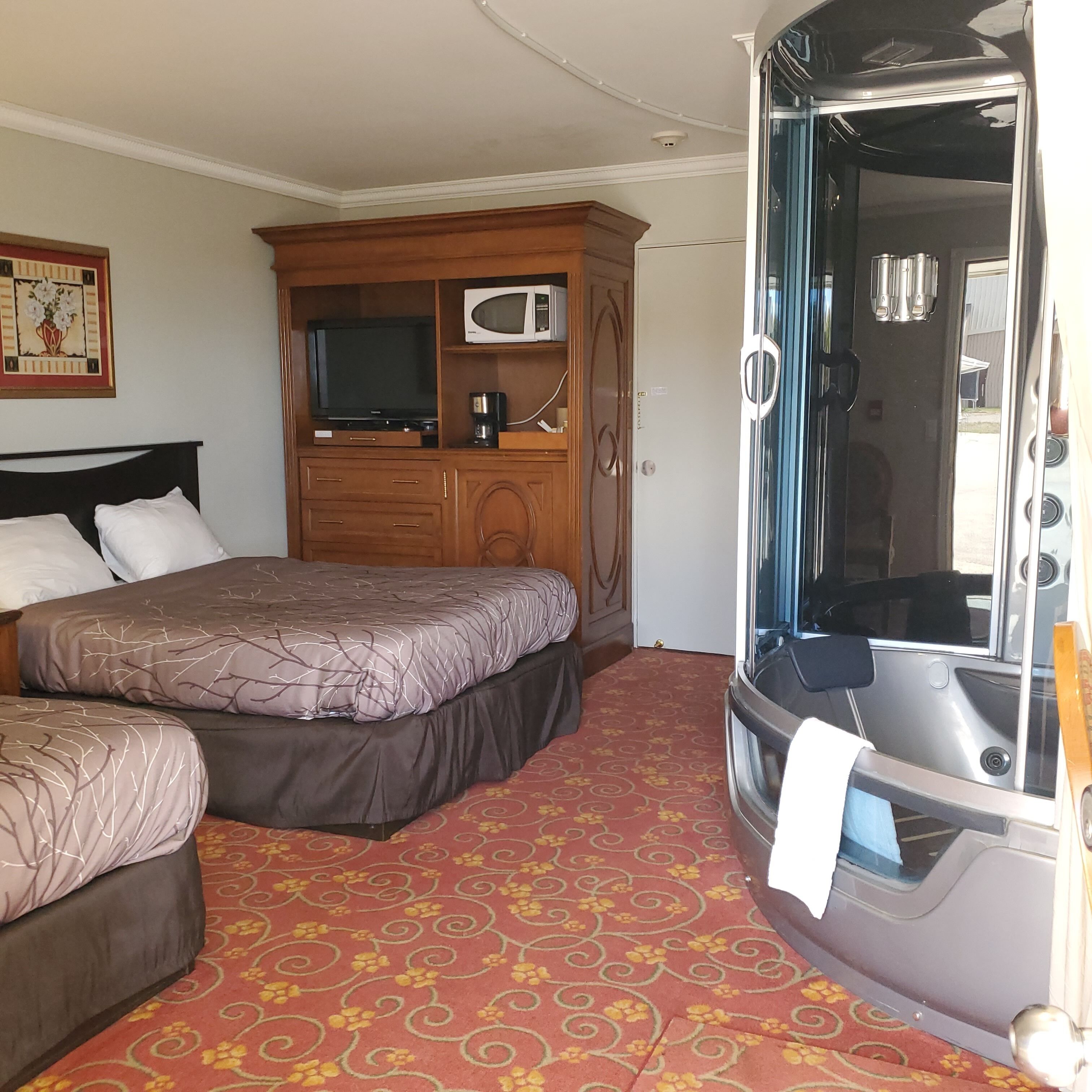 room, 2 double beds, jetted tub | 1 bedroom, blackout curtains, iron/ironing board, free wifi