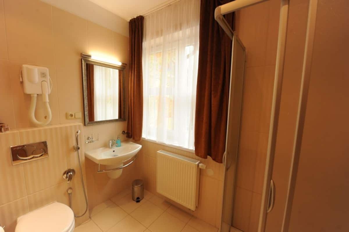 shower, free toiletries, hair dryer, dressing gowns