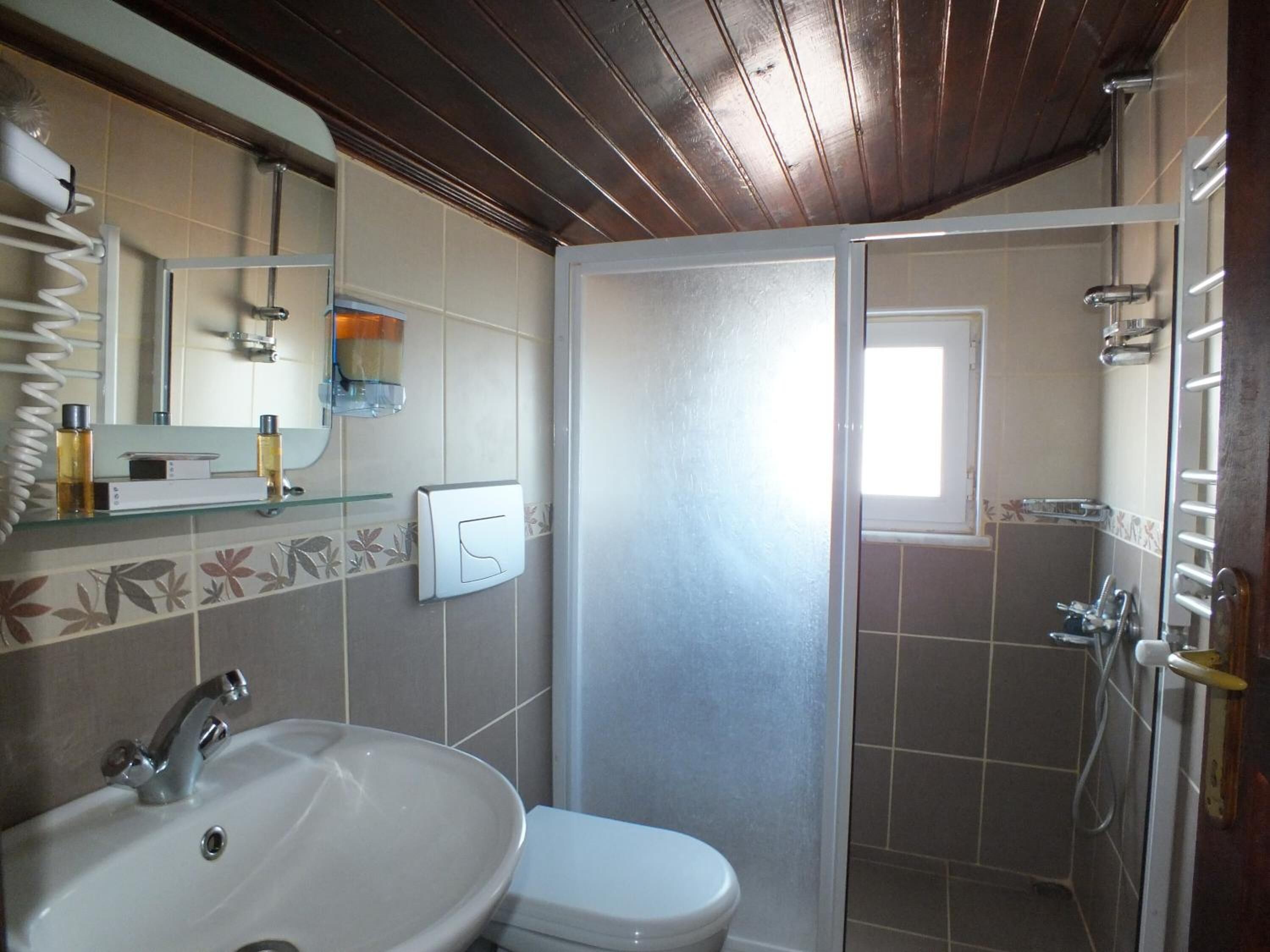 triple room, balcony | bathroom | shower, hair dryer, slippers, towels