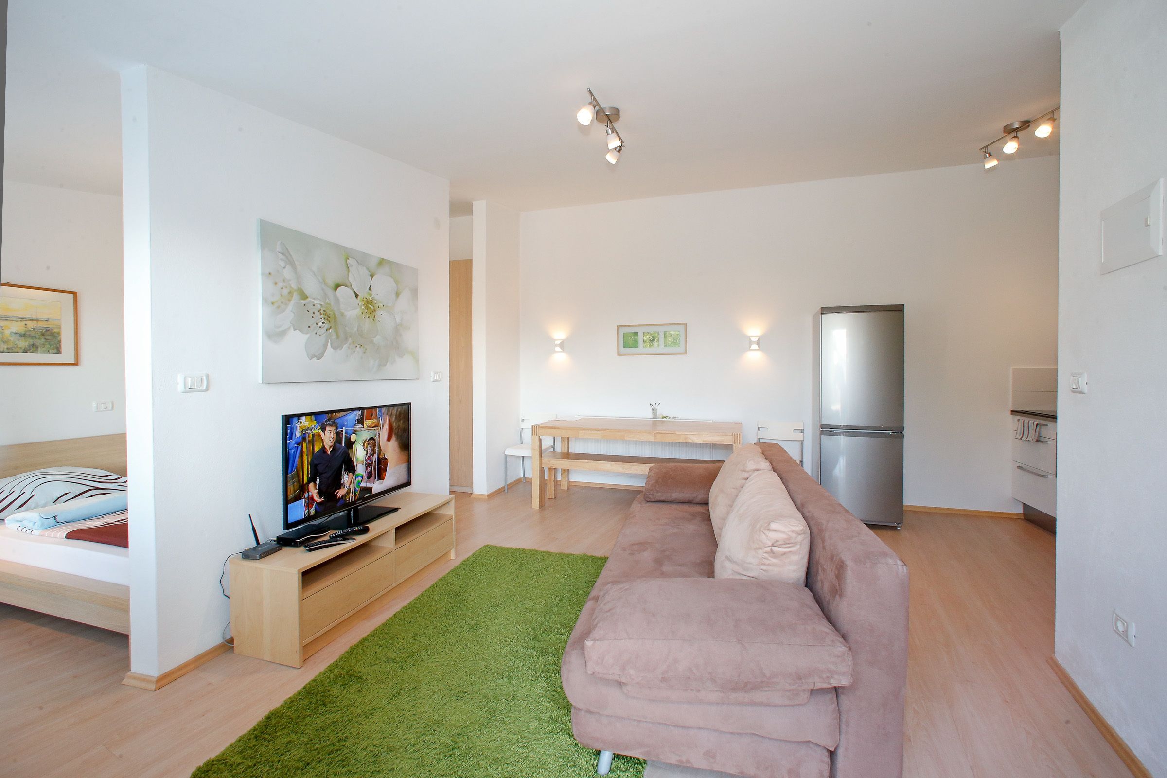 comfort studio suite, sea view | living area | flat-screen tv, pay films