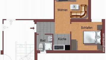 A floor plan of a hotel room with a living area, bedroom, bathroom, and kitchen.