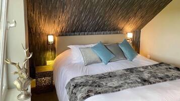 1 bedroom, blackout drapes, soundproofing, iron/ironing board