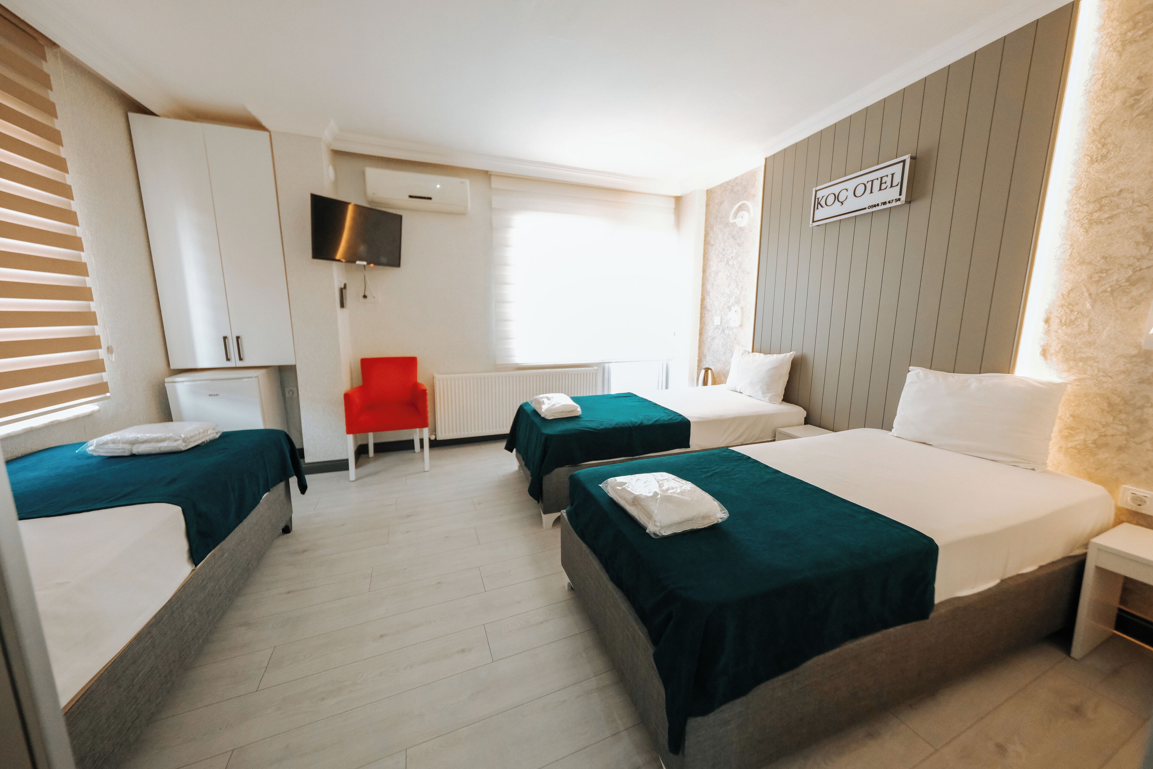 classic quadruple room | minibar, in-room safe, individually decorated, individually furnished