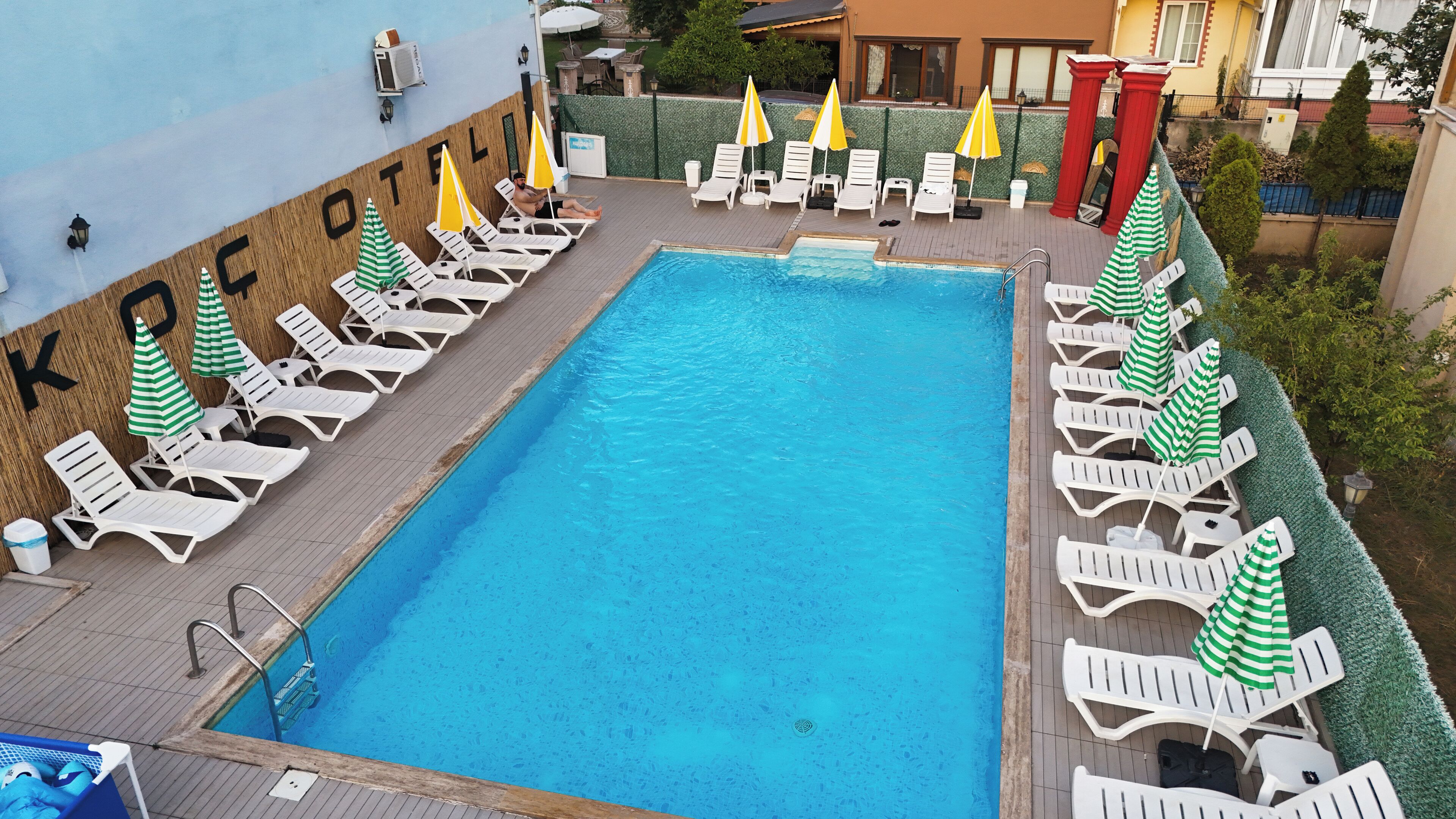 seasonal outdoor pool, open 10:00 am to 6:30 pm, pool umbrellas