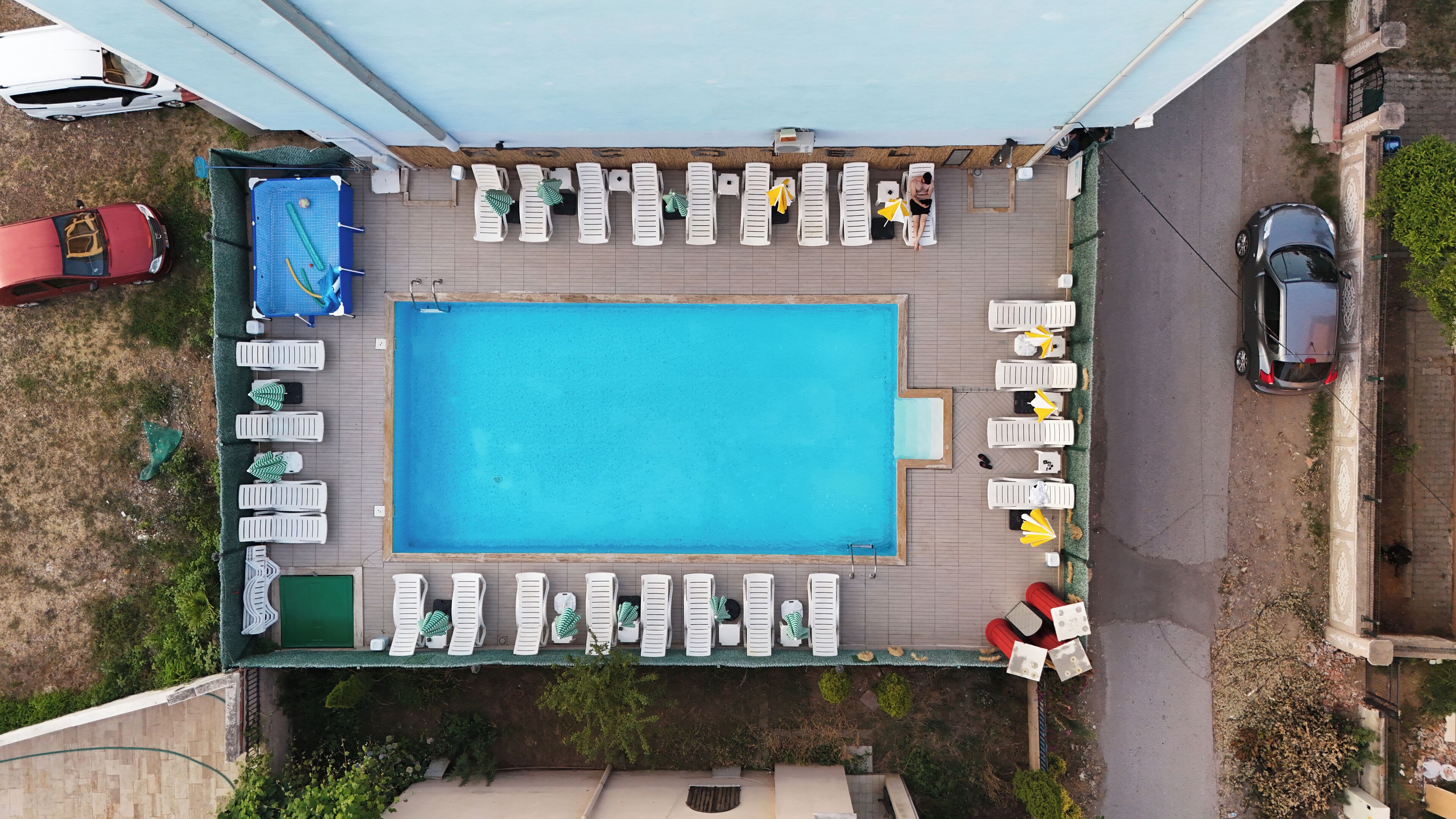 seasonal outdoor pool, open 10:00 am to 6:30 pm, pool umbrellas